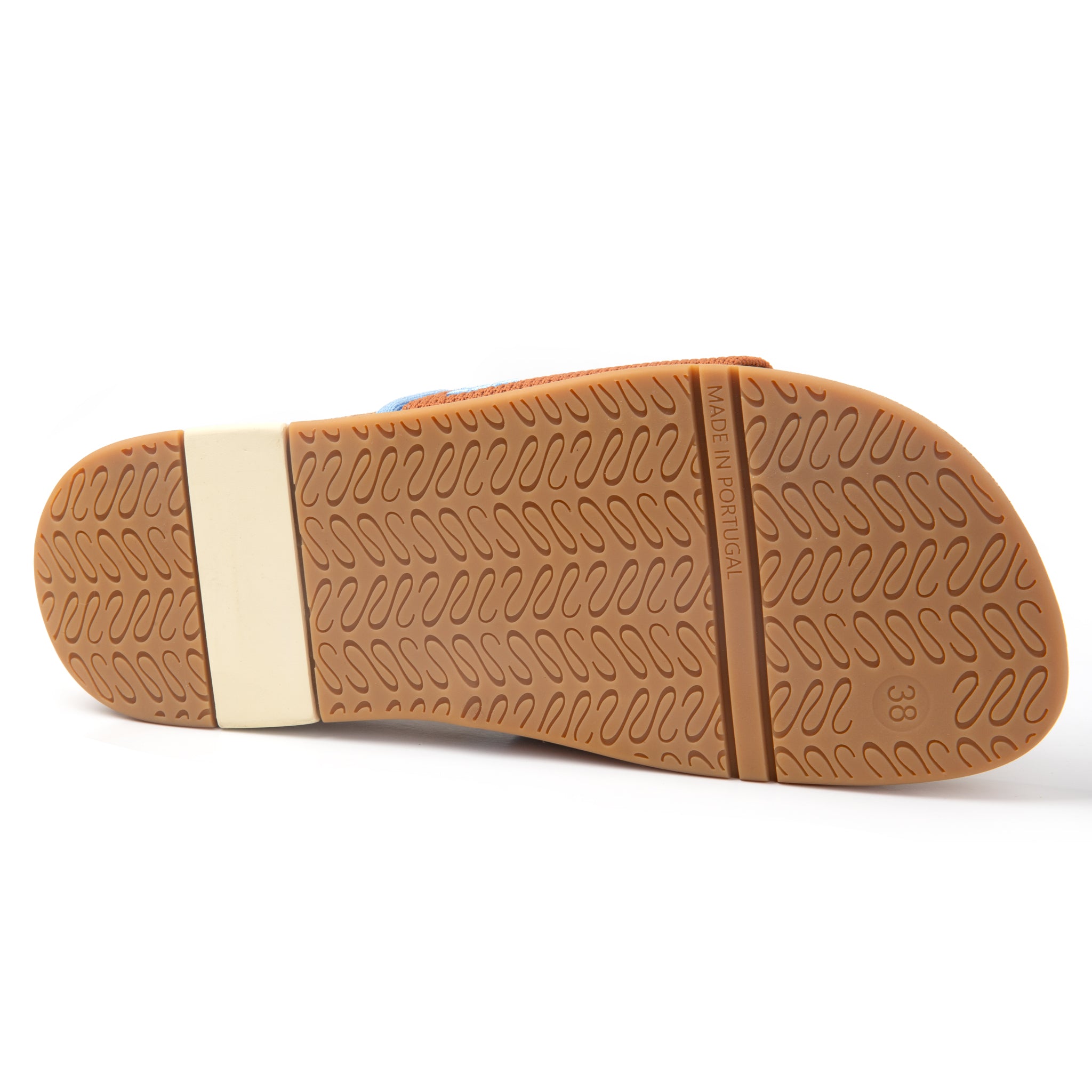 Close-up of a sandal sole with brown rubber and beige insole on a white background