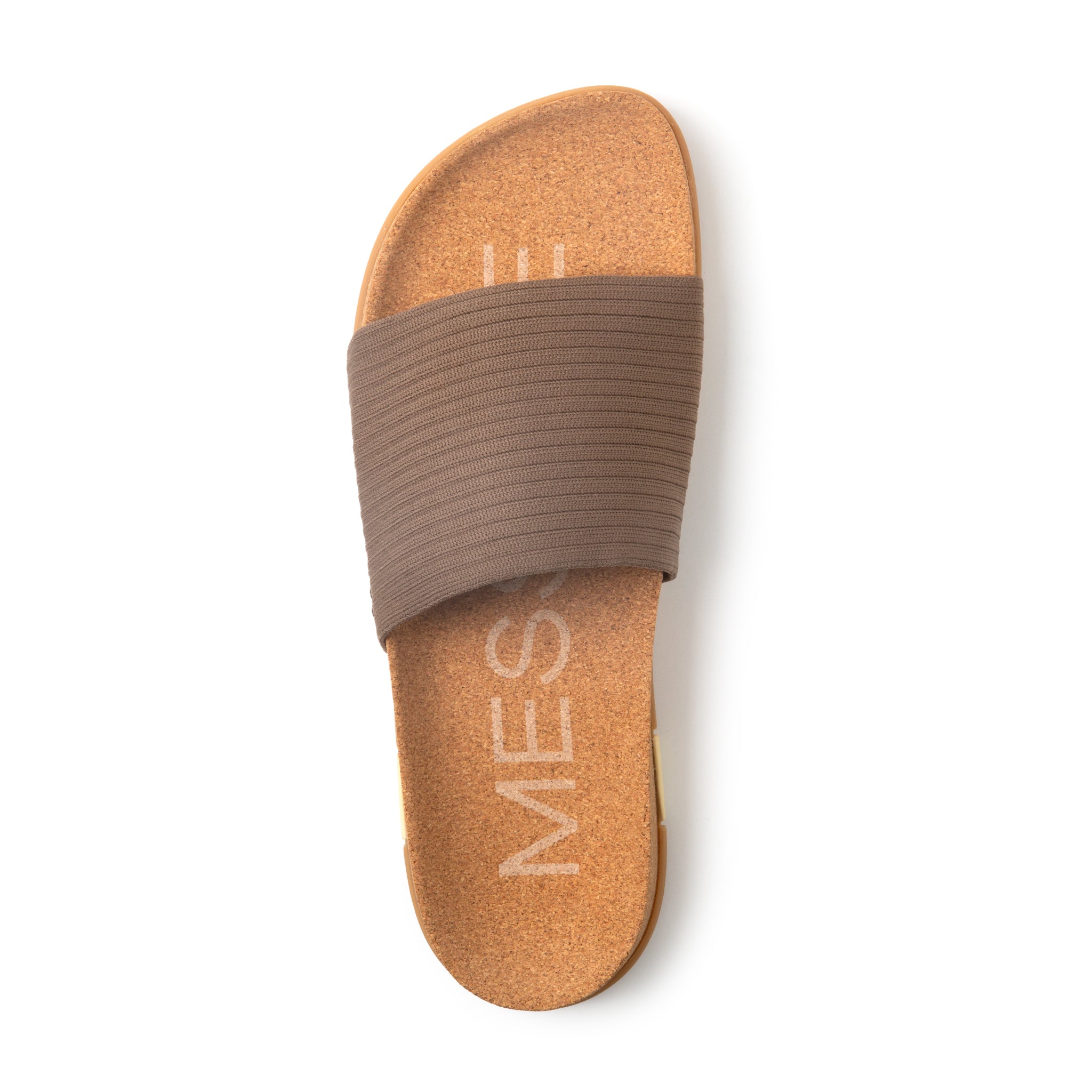 Brown sandal with a brown band on a white background