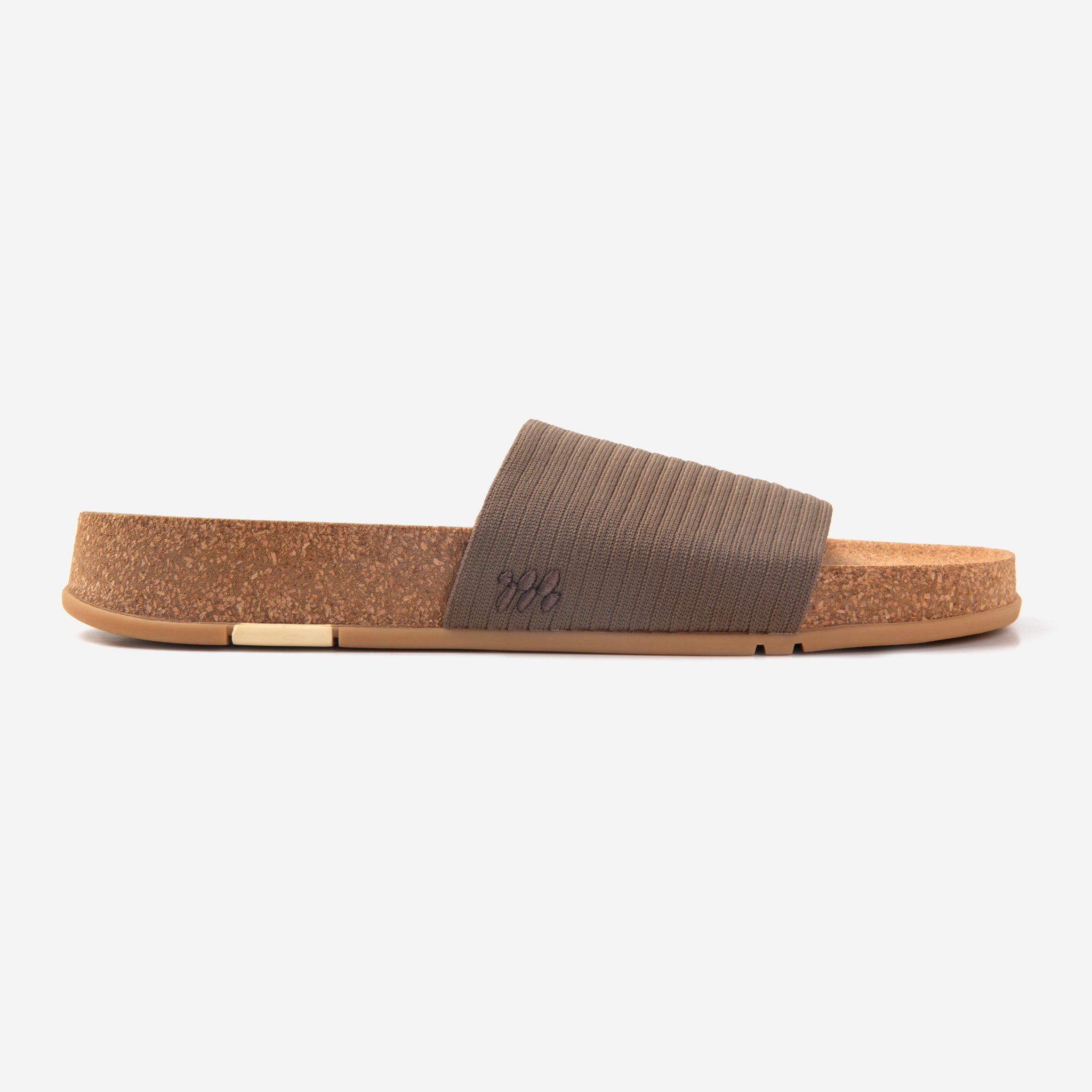 Brown sandal with cork sole on a white background