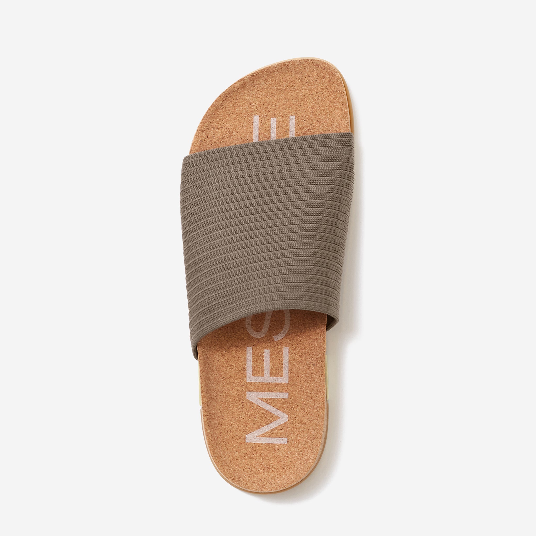 Brown sandal with cork sole on a white background