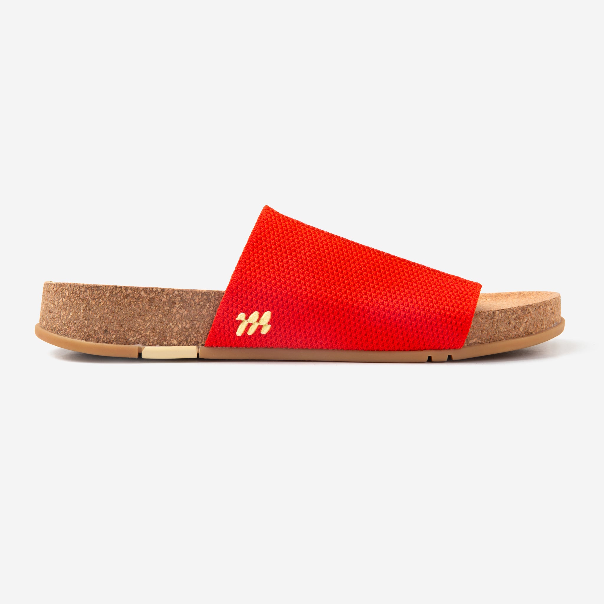 Red sandal with cork sole on a white background