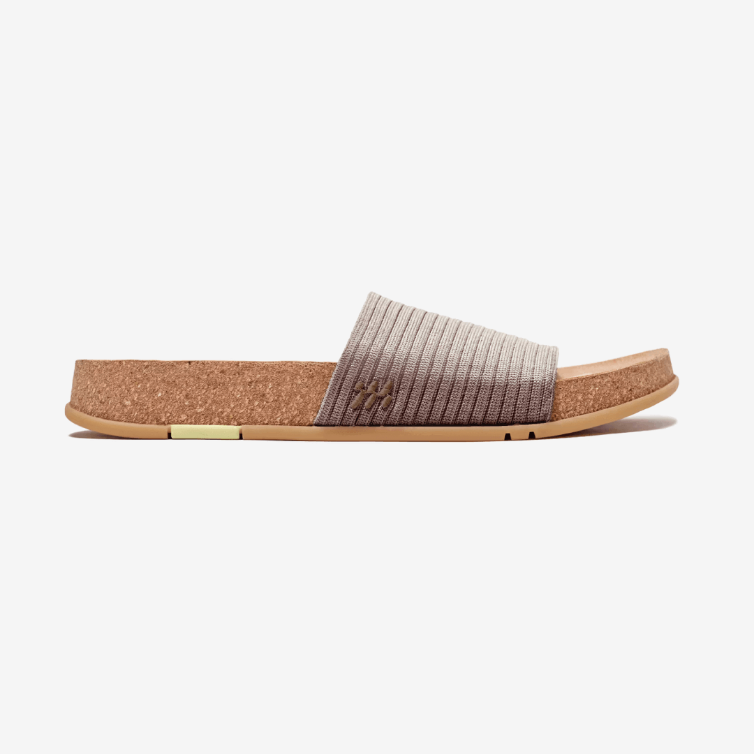 Showcasing the side view of Mullen Ripple Slide in Stone