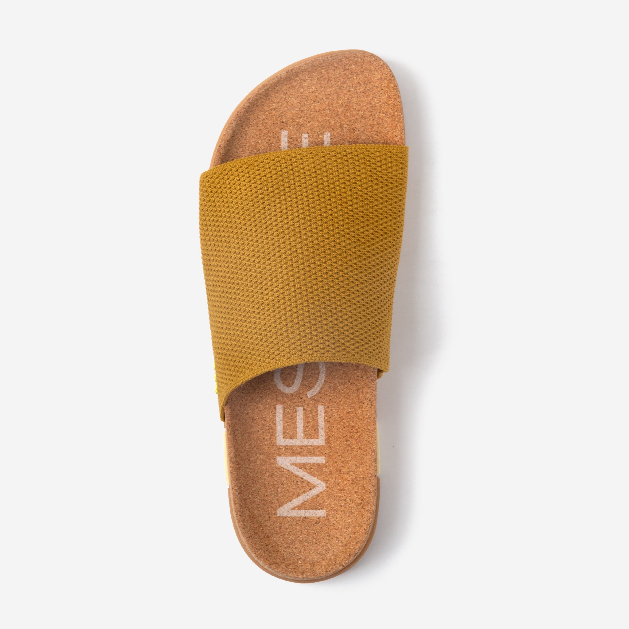 Mustard yellow slide sandal on a white background