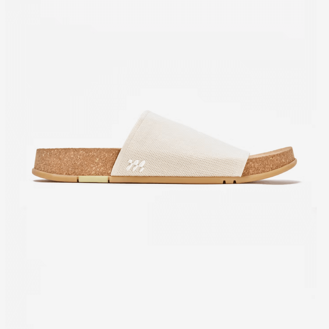 Showcasing the side view of Shaw Classic Slide in Creme