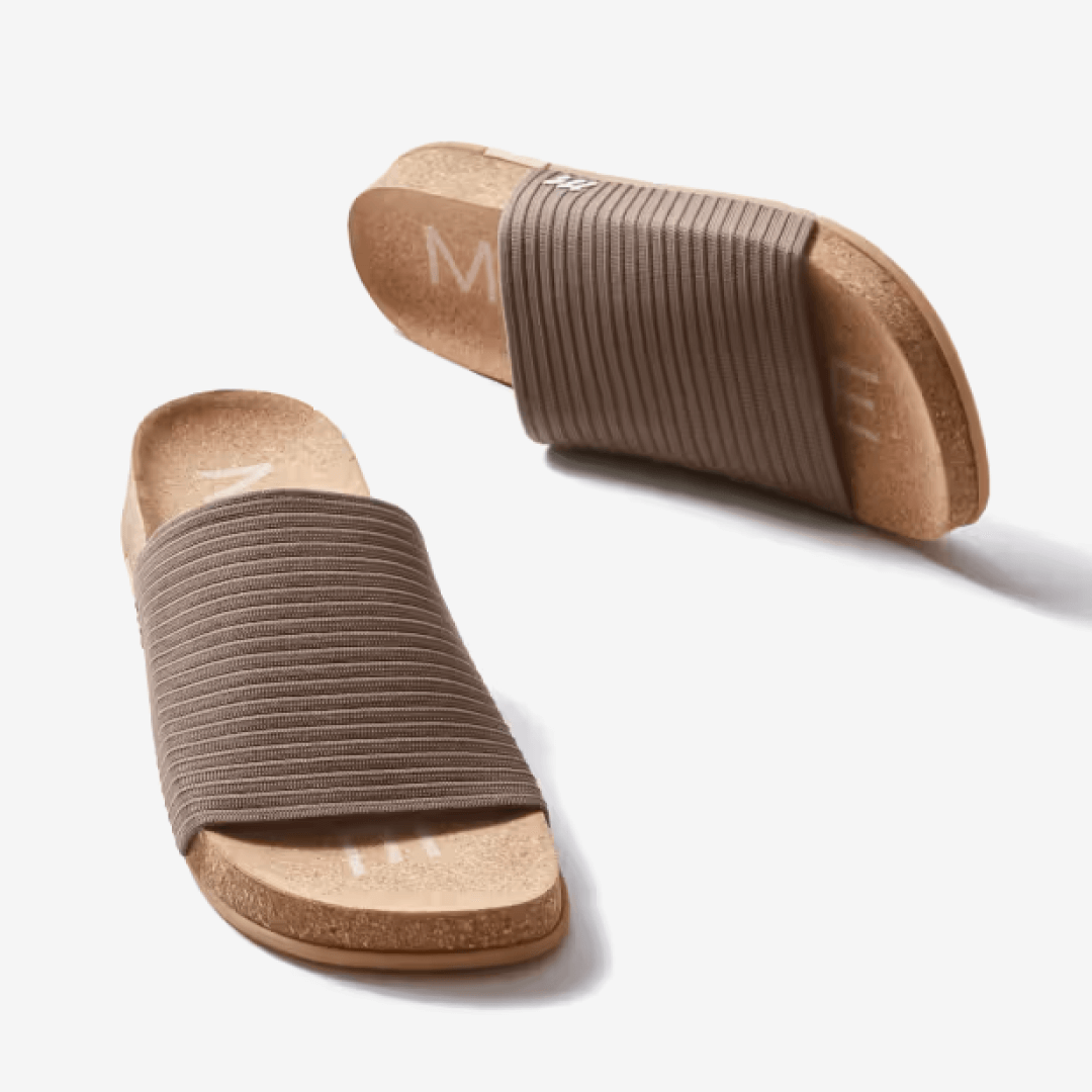 Showcasing a pair of stone Shaw Ripple Slides