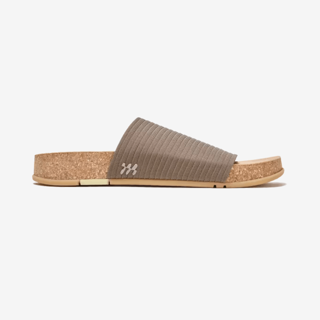 Showcasing the side view of Shaw Ripple Slide in Stone