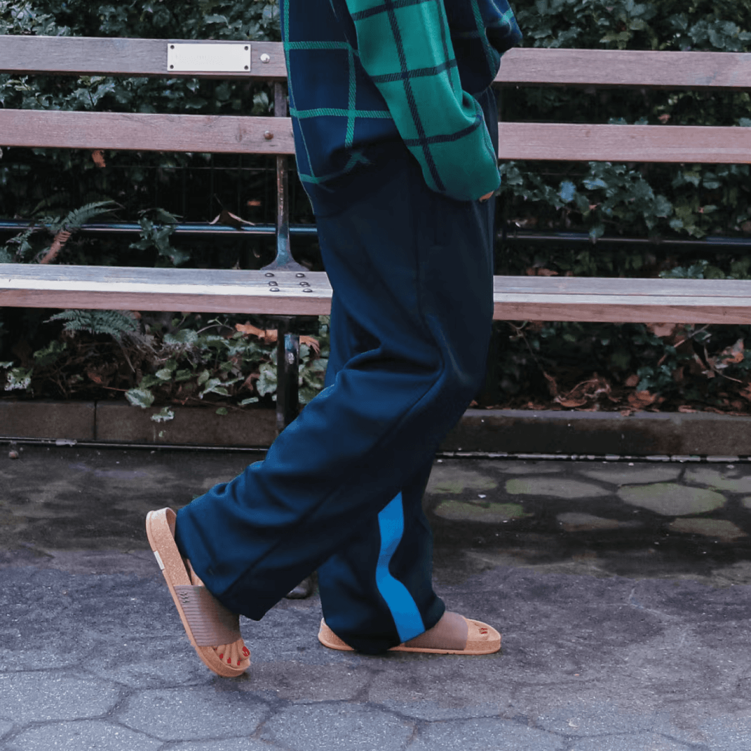 Woman walking in stone Mullen Ripple Slides