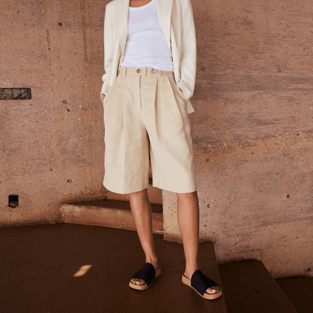 Woman wearing black Shaw Classic Slides