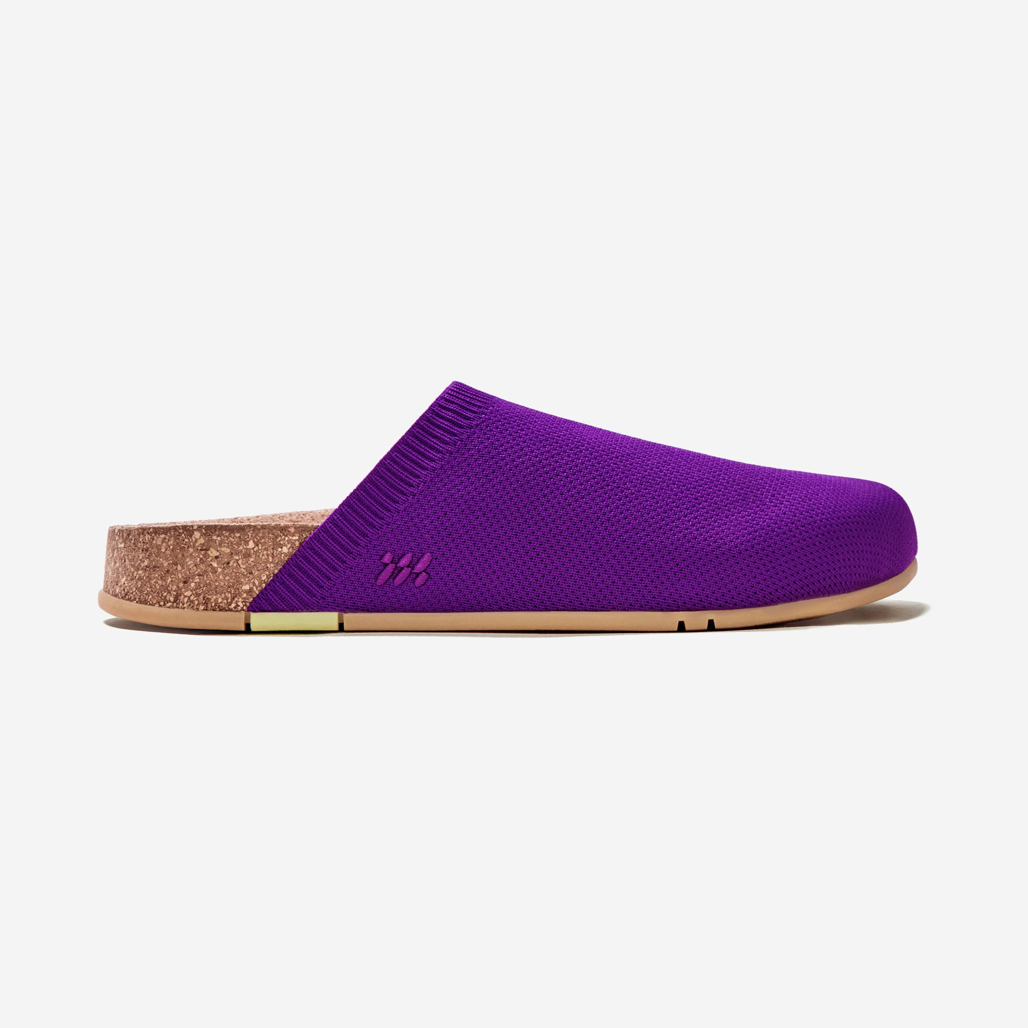 Purple slipper with cork sole on a white background