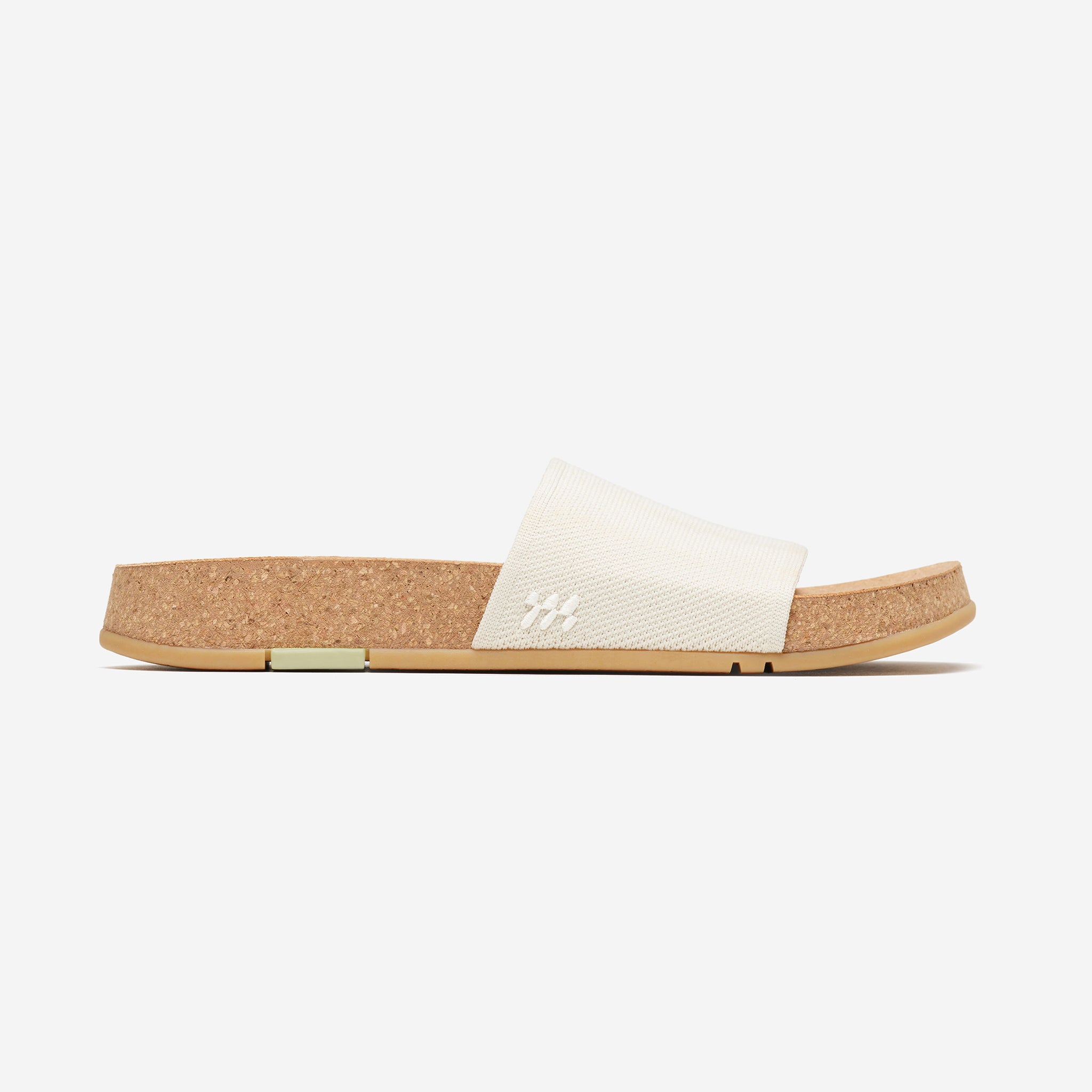Cork sandal with white strap on a white background
