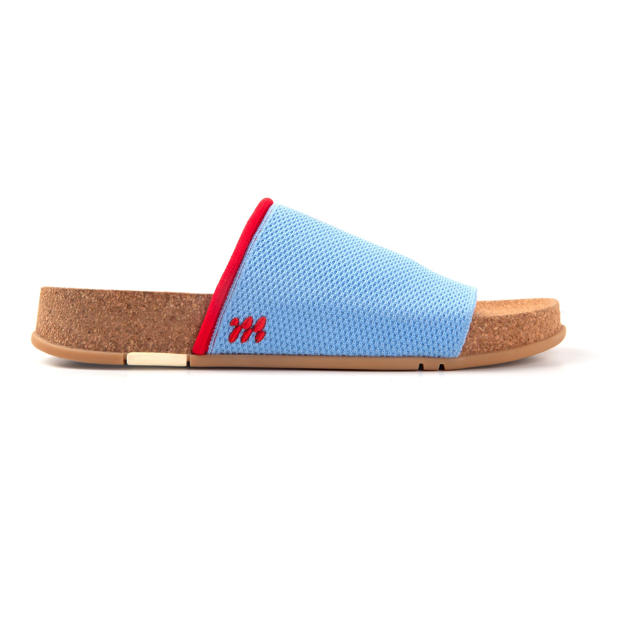 Blue slipper with cork sole on a white background