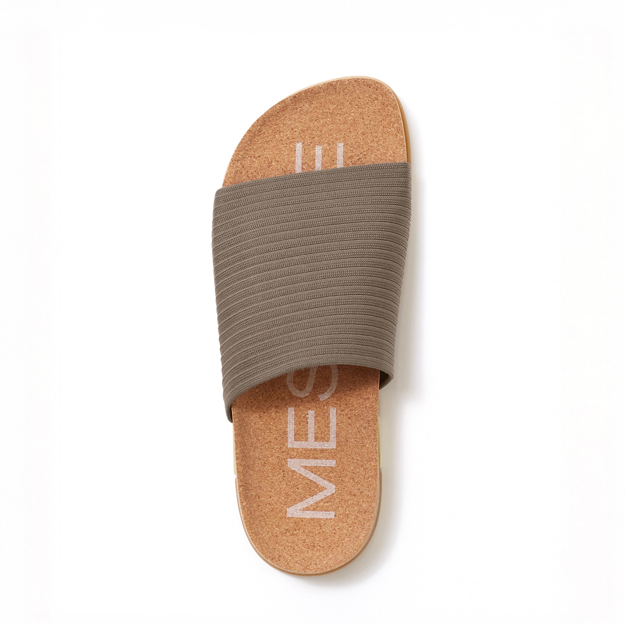 Brown slide sandal with cork sole on a white background