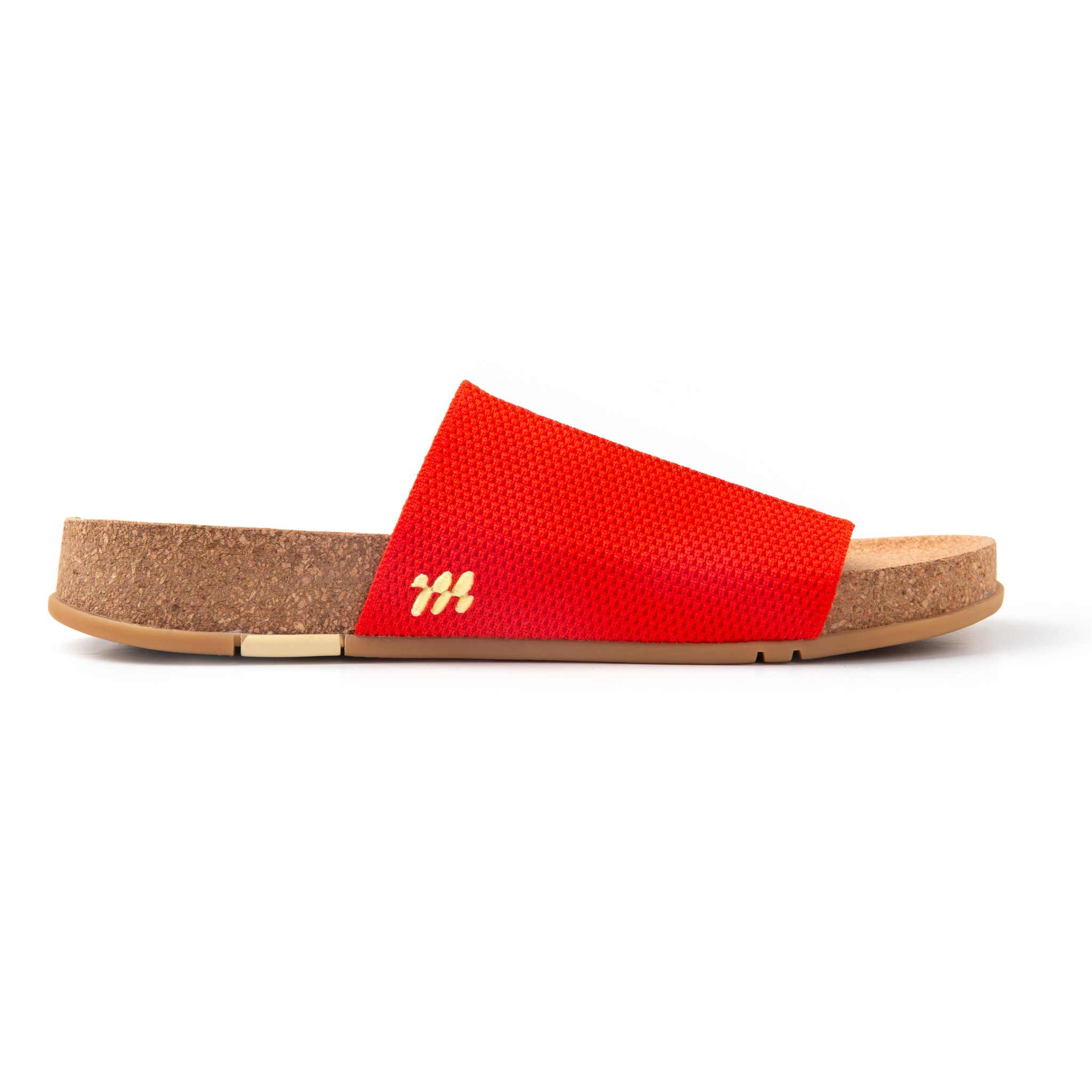 Red sandal with cork sole on a white background