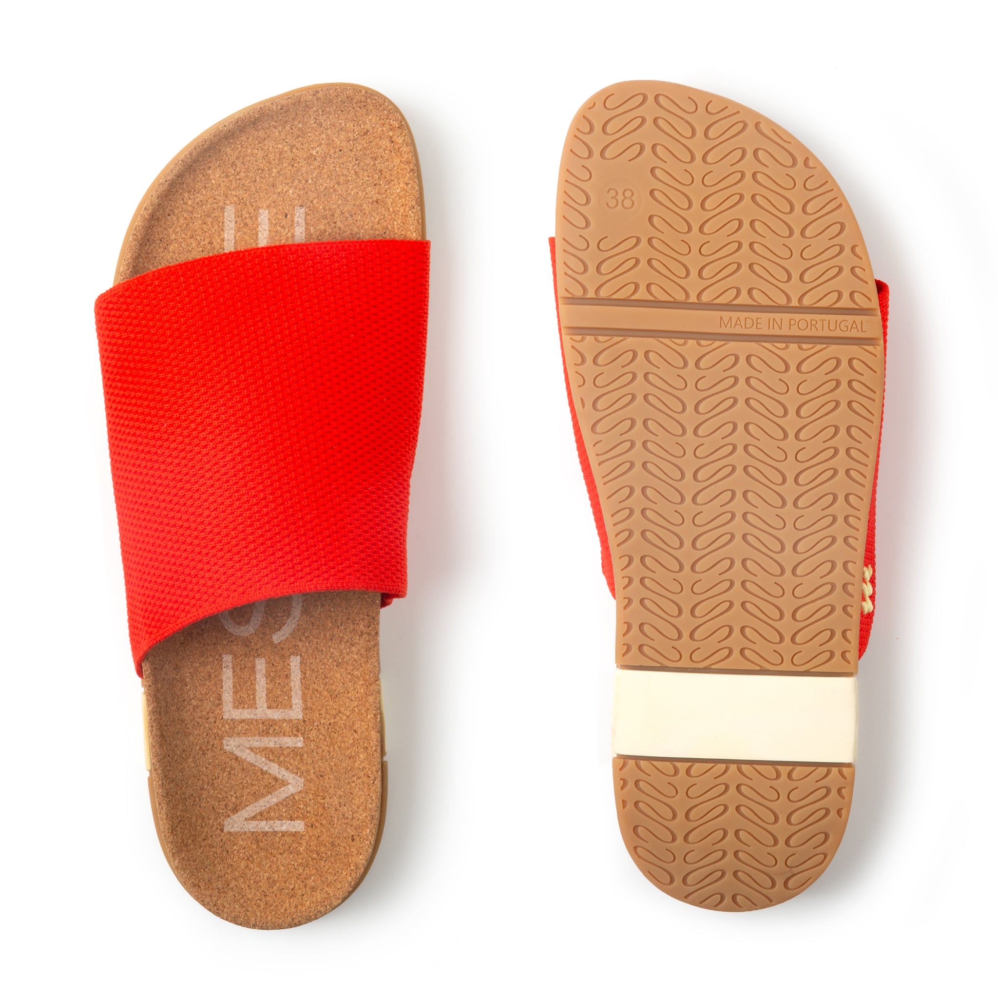 Red slide sandal with cork sole on a white background