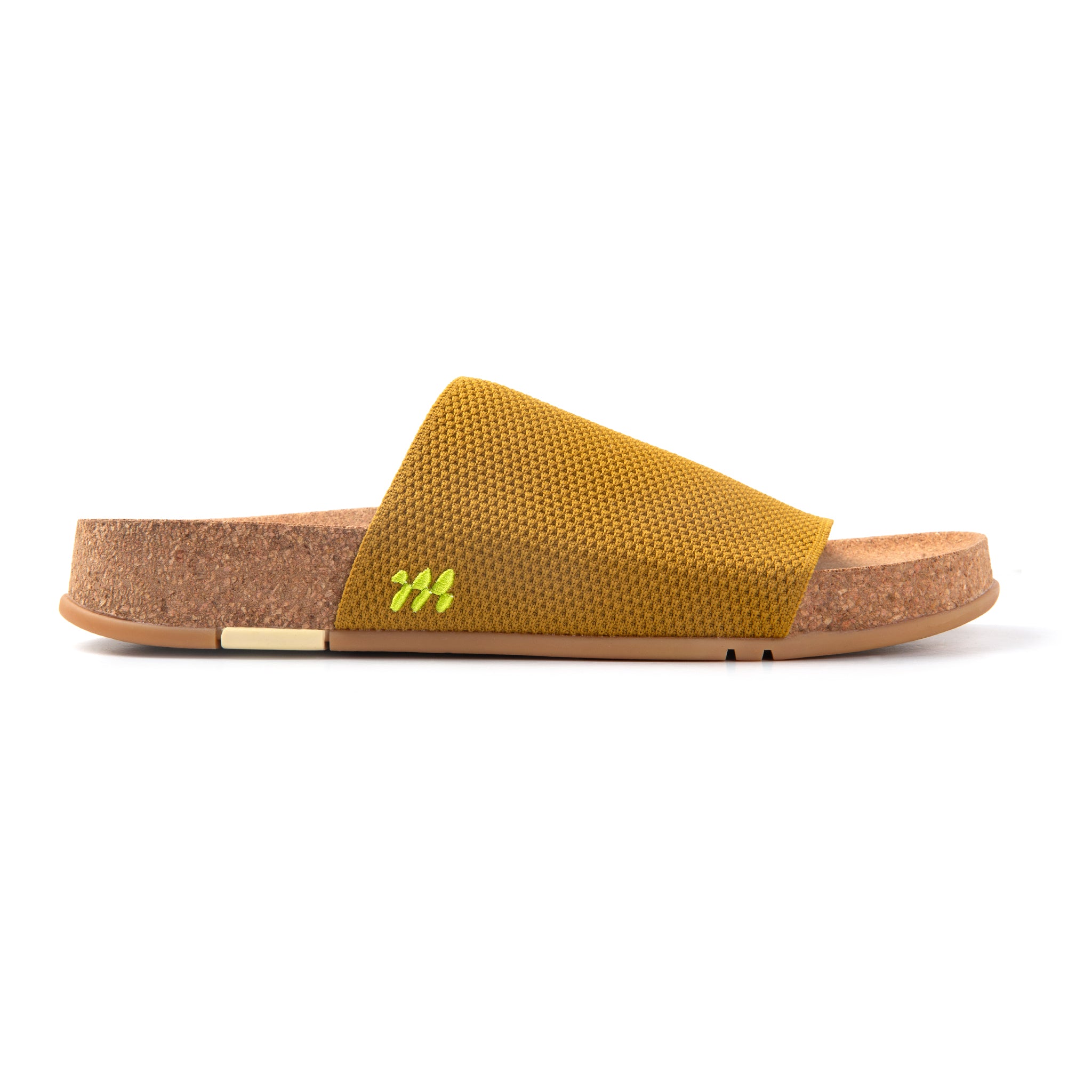 Yellow sandal with cork sole on a white background