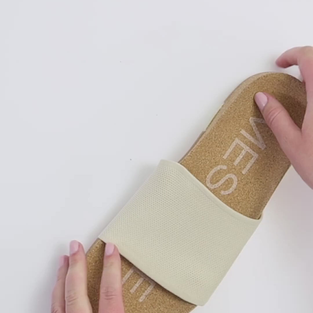 Mullen Classic Slide video showcasing Hugflex™ and  barecork™ technology. Our hugflex™ strap provides a secure, compressive fit that hugs your foot comfortably. Flexible enough to move with you, built for all-day support.
