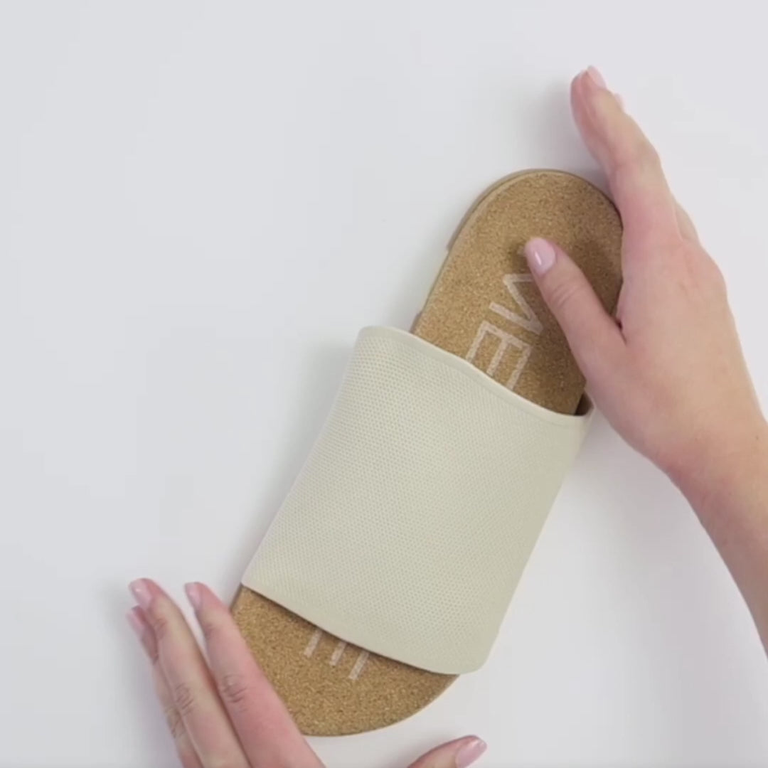 Shaw Classic Slide video showcasing Hugflex™ and  barecork™ technology. Our hugflex™ strap provides a secure, compressive fit that hugs your foot comfortably. Flexible enough to move with you, built for all-day support.
