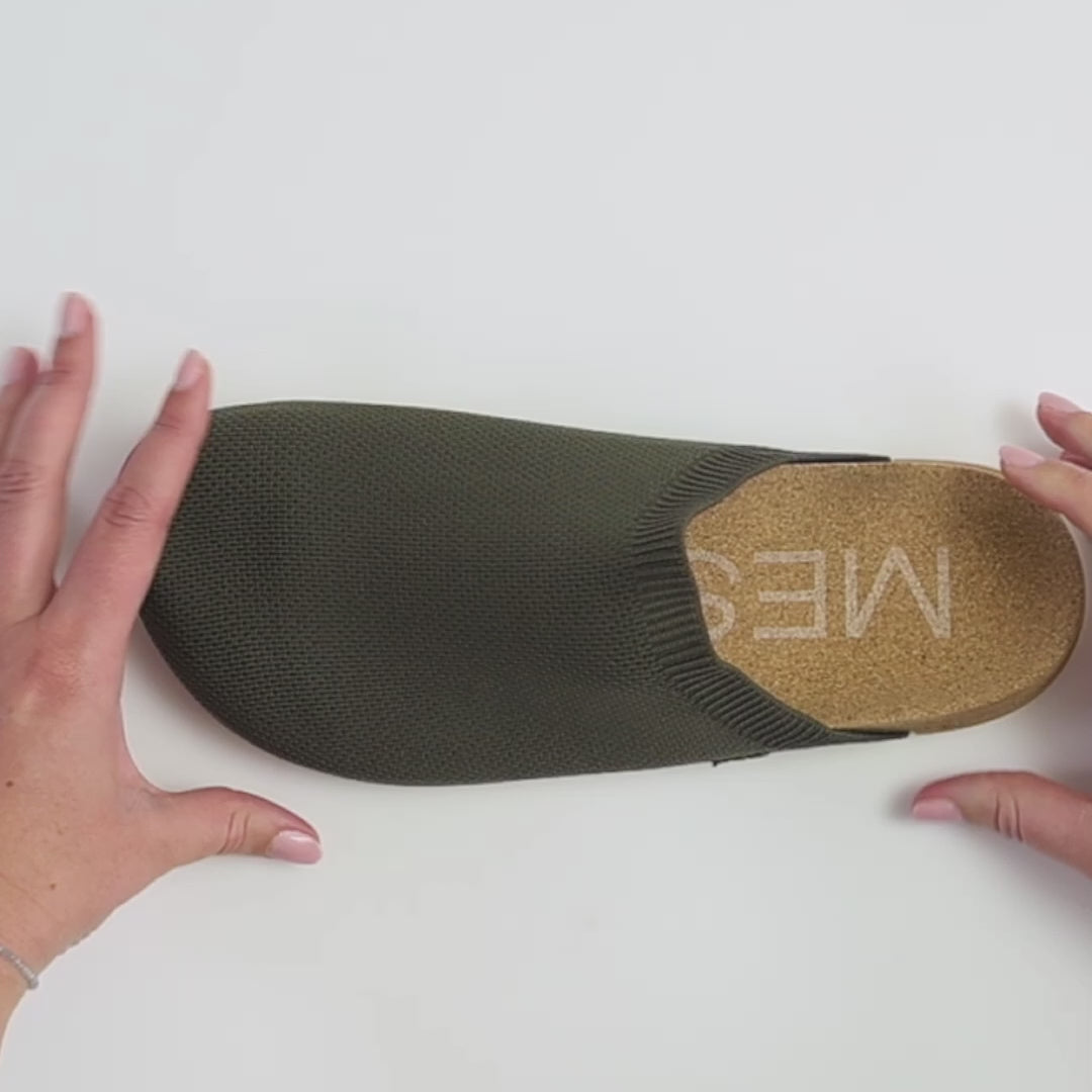 Henning Classic Mule video showcasing Hugflex™ and  barecork™ technology. Our hugflex™ strap provides a secure, compressive fit that hugs your foot comfortably. Flexible enough to move with you, built for all-day support.